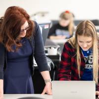Professor Jennifer Gross, PSY, working with a  student